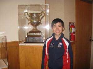 Vincent with the Jr Men National Champion trophy at USFS Museum and Hall of Fame